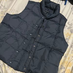 Lands end puffer vest, navy blue size large. In very good condition.